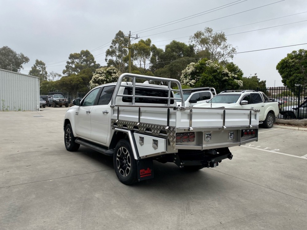 This is a photo of a Toyota Tacoma with a Heavy Duty Aluminium Flatbed
